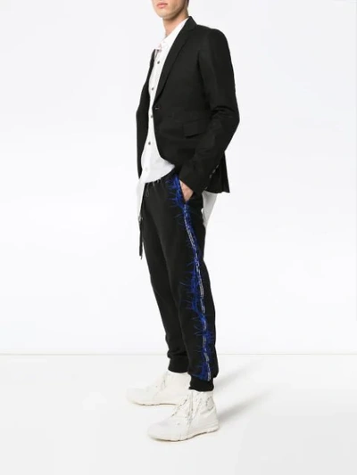 Shop Haider Ackermann Embroidered Track Trousers In Black