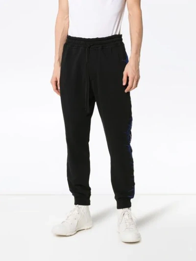 Shop Haider Ackermann Embroidered Track Trousers In Black