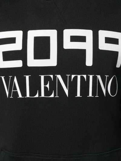 Shop Valentino 2099 Logo Printed Hoodie In Black