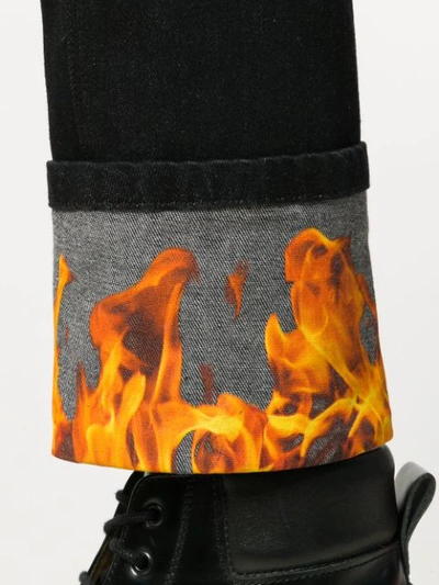 Shop Neil Barrett Flame Jeans In Black