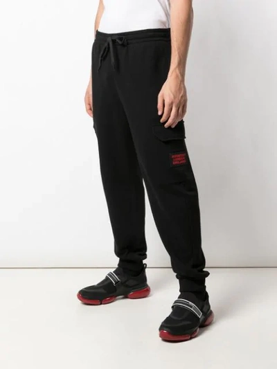 Shop Burberry Logo Patch Track Pants In Black