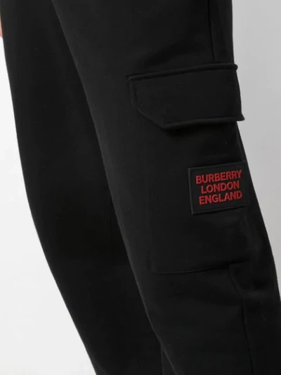 Shop Burberry Logo Patch Track Pants In Black