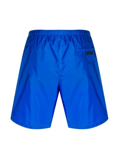 Shop Prada Logo Patch Running Shorts In Blue