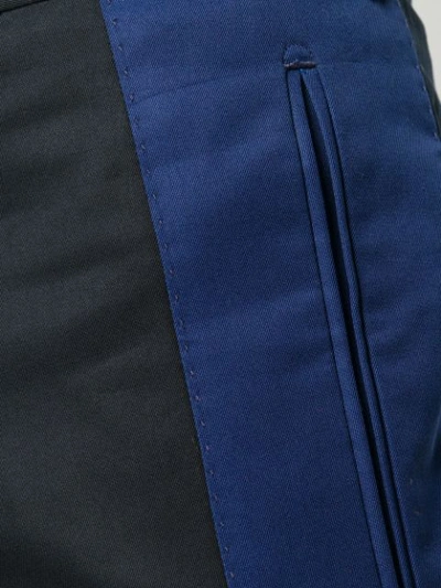 Shop Alexander Mcqueen Stripe Trousers In Blue
