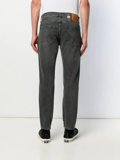 Shop Levi's Faded Denim Jeans In Black