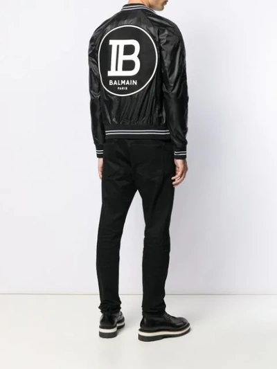 Shop Balmain Logo Print Bomber Jacket In Black