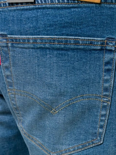 Shop Levi's Distressed Denim Jeans In Blue