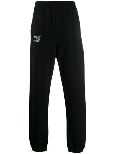 Shop Ih Nom Uh Nit Logo Print Track Pants In Black