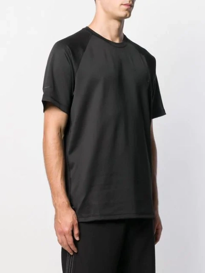 Shop Nike Plain T-shirt In Black