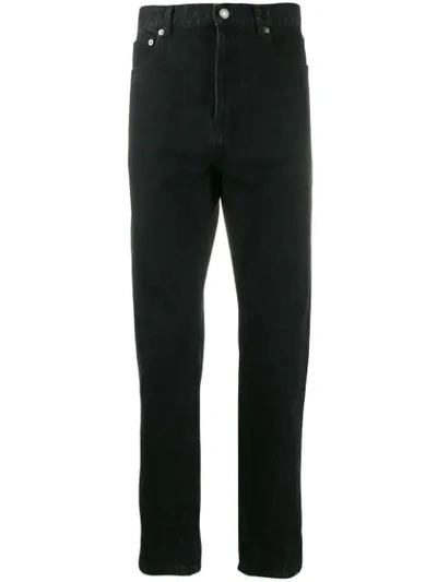 Shop Saint Laurent Slim-fit Jeans In Black