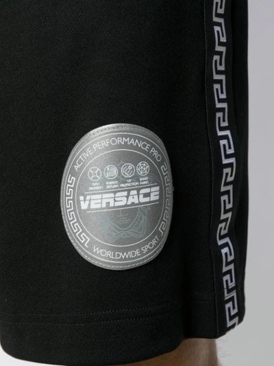 Shop Versace Logo Patch Track Shorts In Black