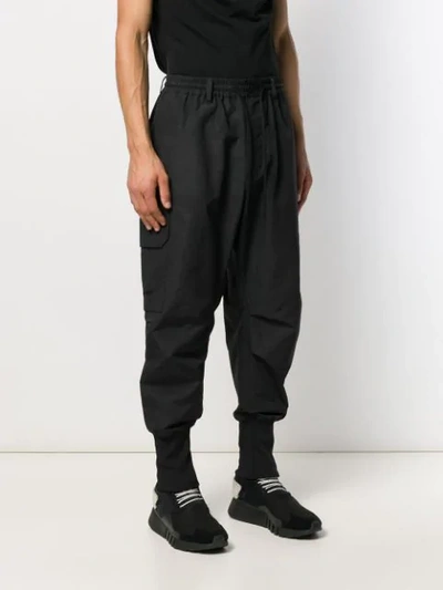 Shop Y-3 Exaggerated Ankle Trackpants In Black