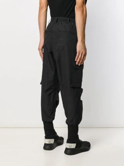 Shop Y-3 Exaggerated Ankle Trackpants In Black