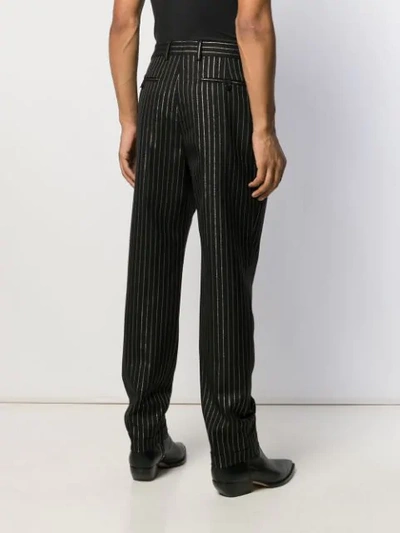 Shop Saint Laurent Metallic-pinstripe Tailored Trousers In Black