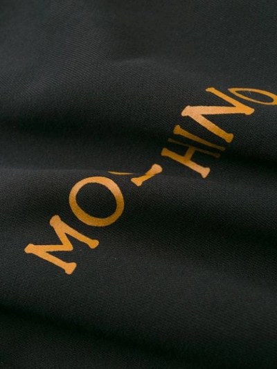 Shop Moschino Rear Printed Hoodie In Black