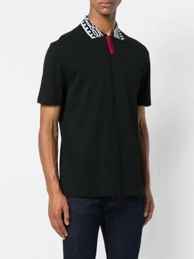 Shop Versace Front Zipped Polo Shirt - Black