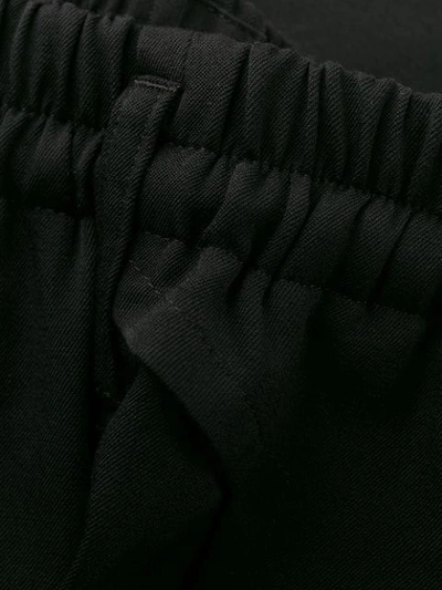 Shop Yohji Yamamoto Cropped Trousers In Black