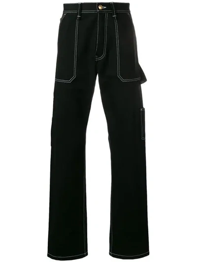 Shop Versace Contrast Stitch Jeans In Black