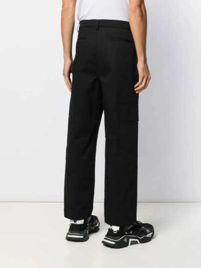 Shop Valentino Cargo Panelled Trousers In Black