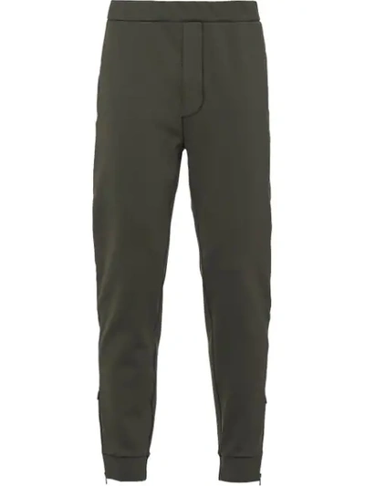 Shop Prada Punto Stoffa Track Trousers In F0n06 Dark Green+black