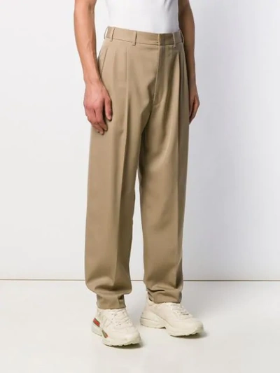 Shop Gucci Loose Tapered Trousers In Neutrals