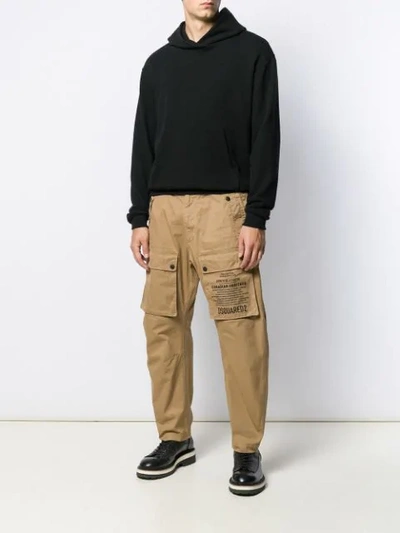 Shop Dsquared2 Script Print Utility Trousers In Brown