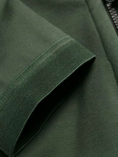Shop Nike Hooded Jersey Jacket In Green