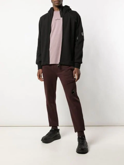 C.p. Company Round Logo Track Pants In Brown