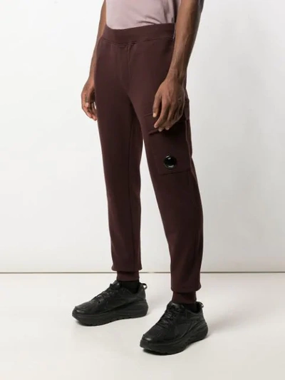 C.p. Company Round Logo Track Pants In Brown