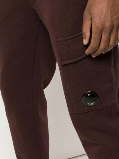 C.p. Company Round Logo Track Pants In Brown