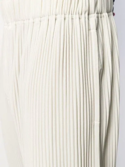 Shop Issey Miyake Plissé Trousers In Neutrals