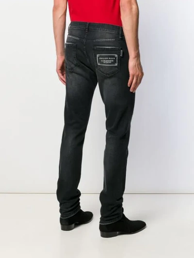 Shop Philipp Plein Slim Fit Statement Jeanss In Black