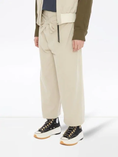 Shop Jw Anderson Drawstring Double Front Trousers In Neutrals