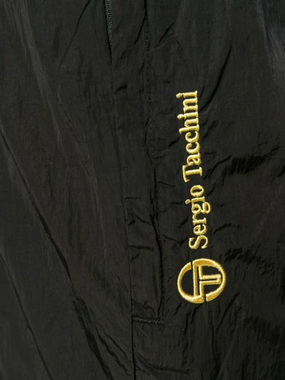 Shop Sergio Tacchini Logo Track Pants In Black