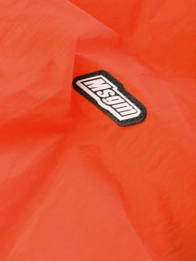 Shop Msgm Overshirt Patch Jacket In Orange