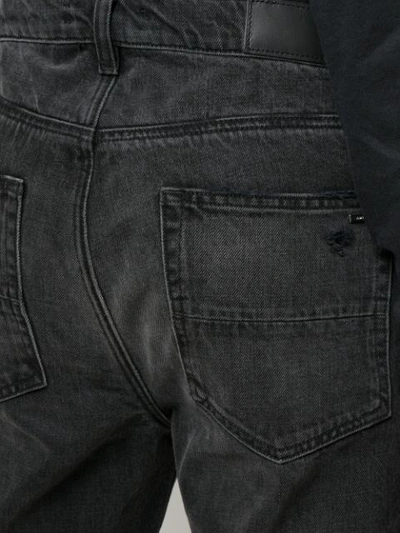 Shop Amiri Thrasher Loose Jeans In Black