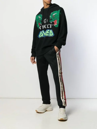 Shop Gucci Logo Stripe Track Pants In Black