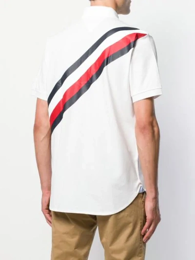 Shop Tommy Hilfiger Th Stripe Polo Shirt In White