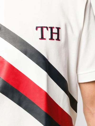 Shop Tommy Hilfiger Th Stripe Polo Shirt In White