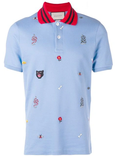 Shop Gucci Patched Motifs Polo Shirt In Blue