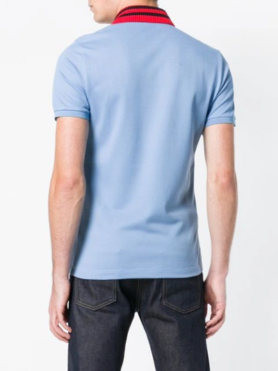 Shop Gucci Patched Motifs Polo Shirt In Blue