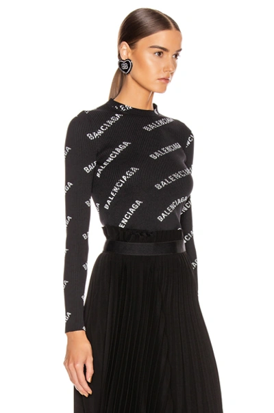 Shop Balenciaga Long Sleeve Rib Knit Top In Abstract,black In Black & White