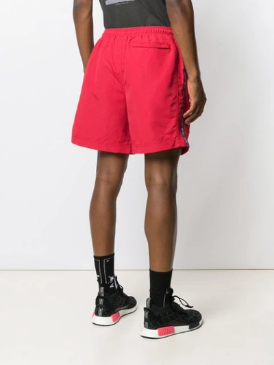 STUSSY 条纹细节运动短裤 - 红色