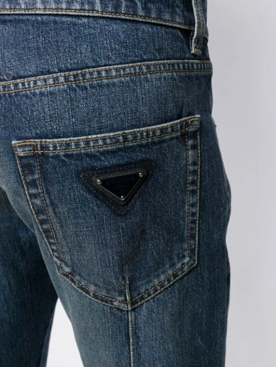 Shop Prada Distressed Straight Leg Jeans In Blue