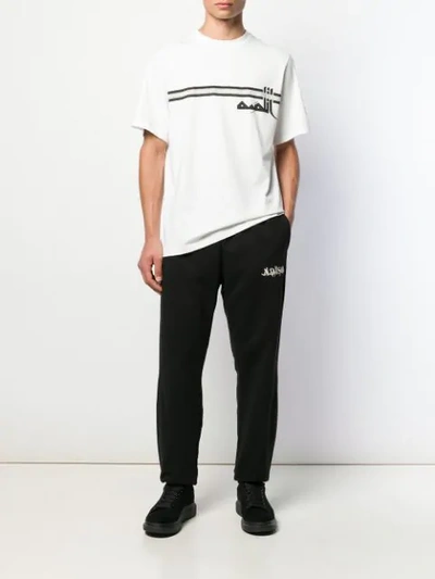 Shop Adish Logo Track Pants In Black