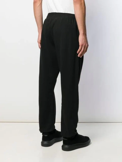 Shop Adish Logo Track Pants In Black