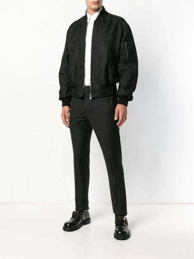 Shop Versace Embroidered Bomber Jacket In Black