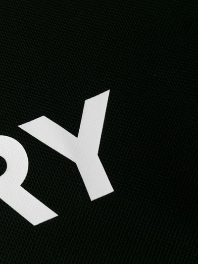 Shop Burberry Oversized Logo Polo Shirt In Black