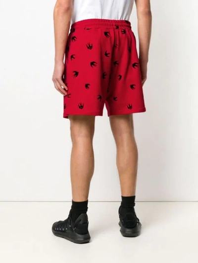 MCQ ALEXANDER MCQUEEN SWALLOW印花短裤 - 红色