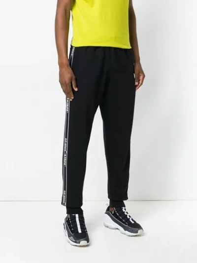Shop Off-white Logo Tape Track Trousers In Black No Color